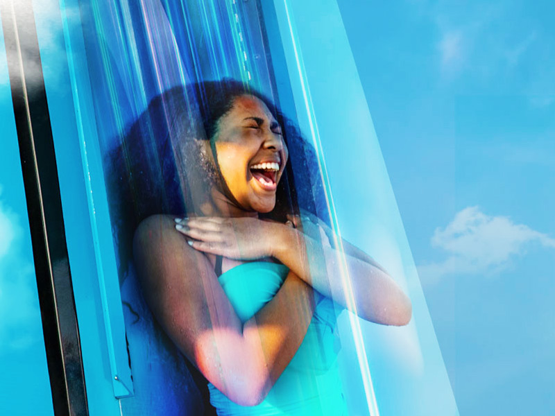 park visitor on bombs away water slide at sandcastle waterpark