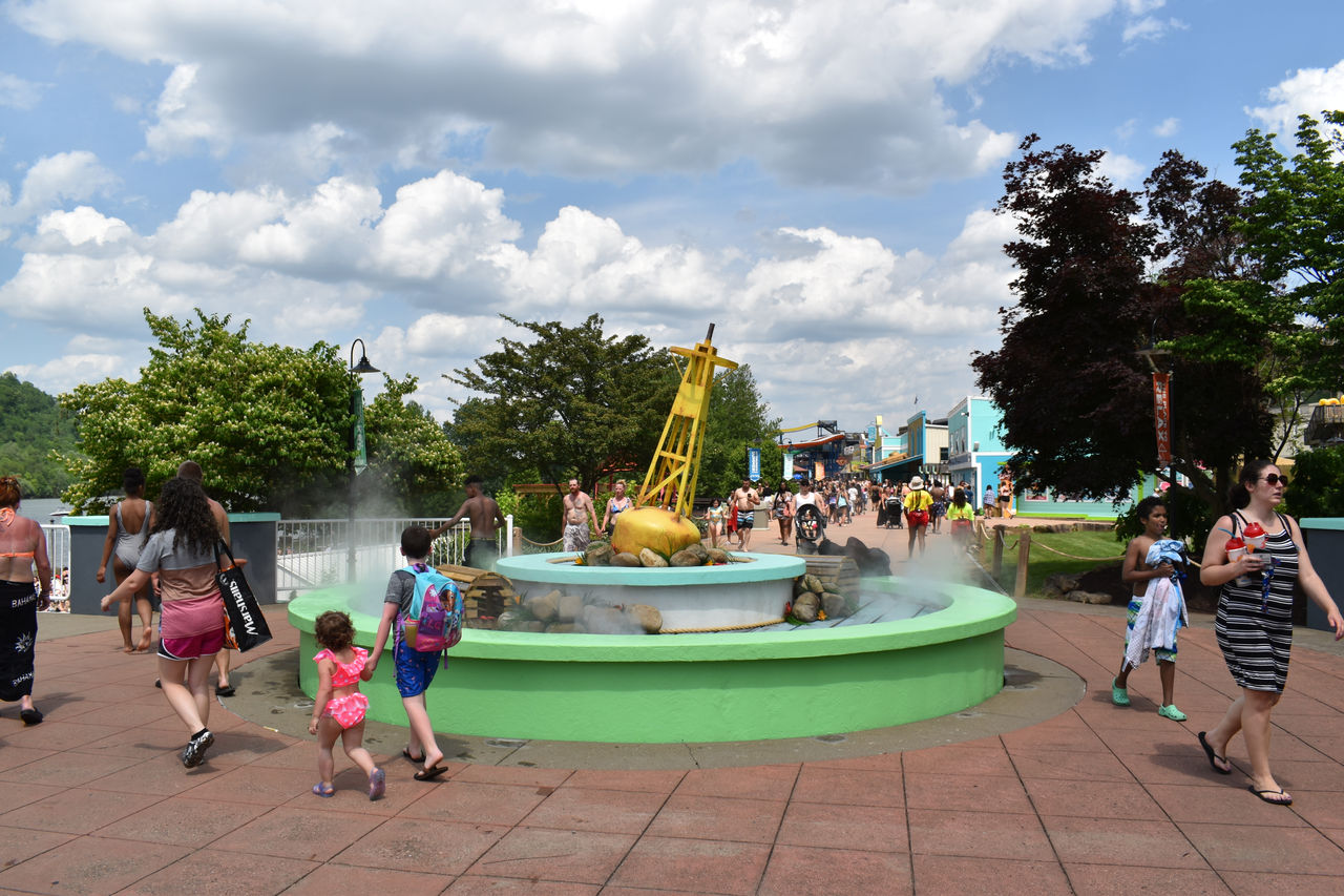 Fountain with people walking