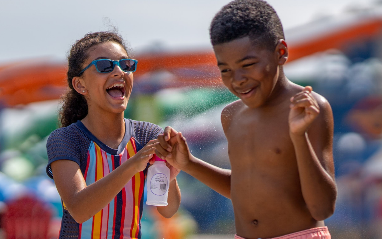 Boy and Girl on Boardwalk